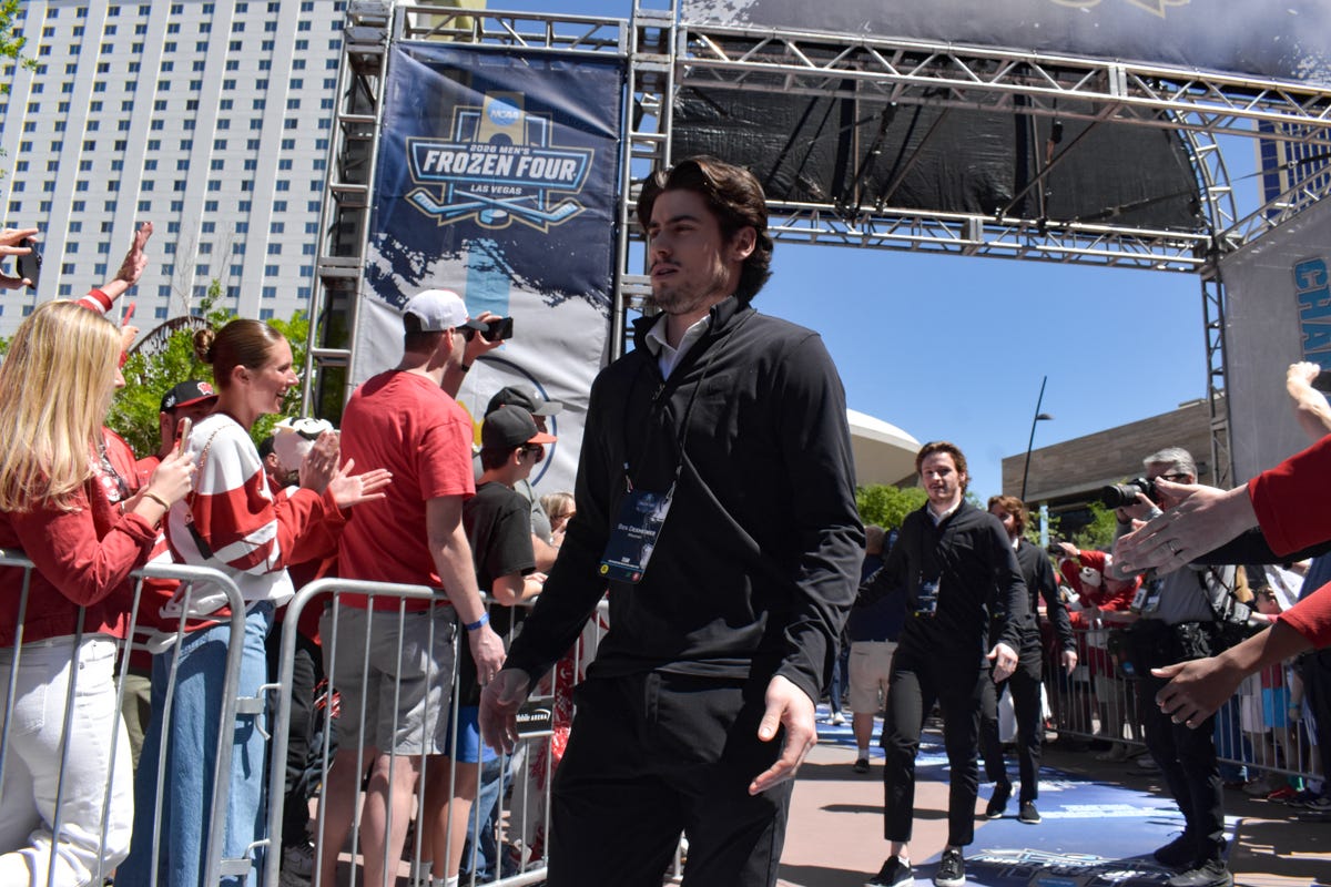 Ben Dexheimer in all black covered by a shadow