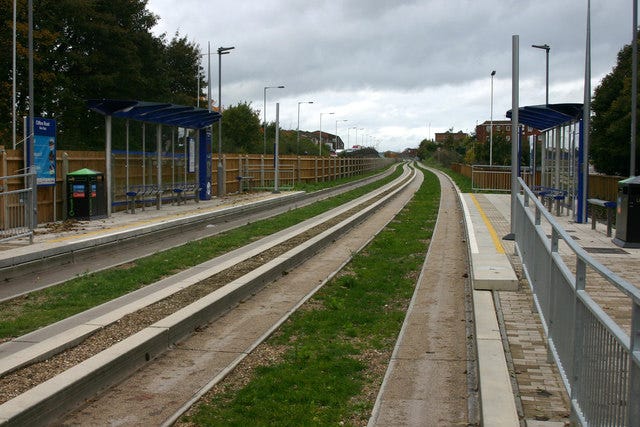 two tracks of the guided busway at a stop two tracks of the guided busway at a stop