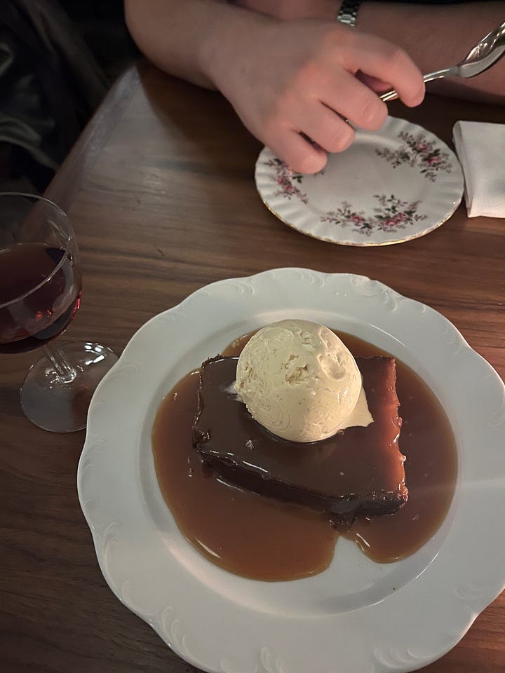 On left, two scotch eggs on a plate and on the right, a ginger pudding with a dollop of vanilla ice cream on top.