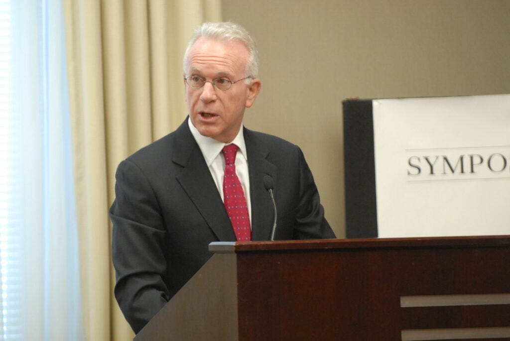 Amb. James Glassman delivering the morning keynote