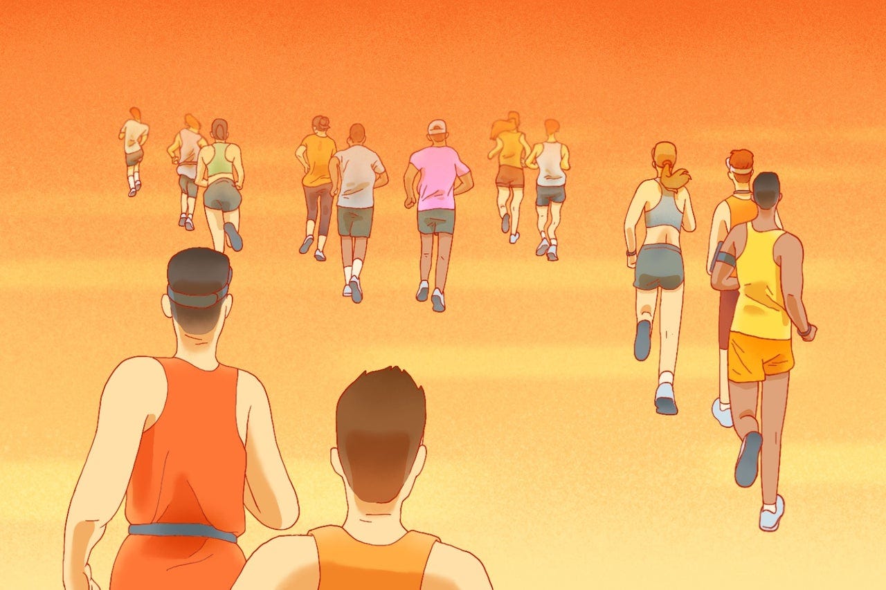 Runners under a haze of orange and yellow.