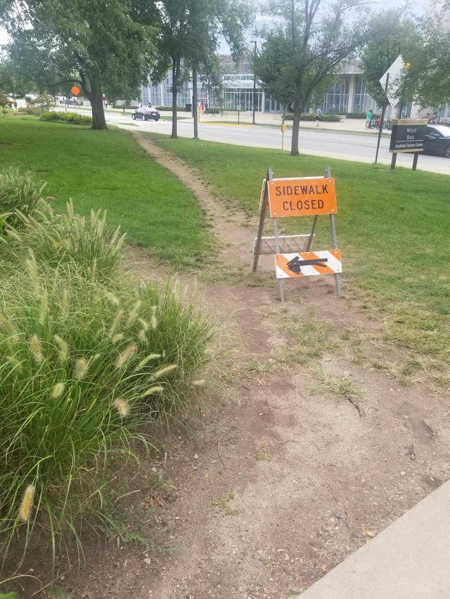 Desire Path Closed - A photo of a worn path over grass, with a sign saying sidewalk closed on it Desire Path Closed - A photo of a worn path over grass, with a sign saying sidewalk closed on it