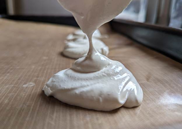 A close up of white substance

AI-generated content may be incorrect.