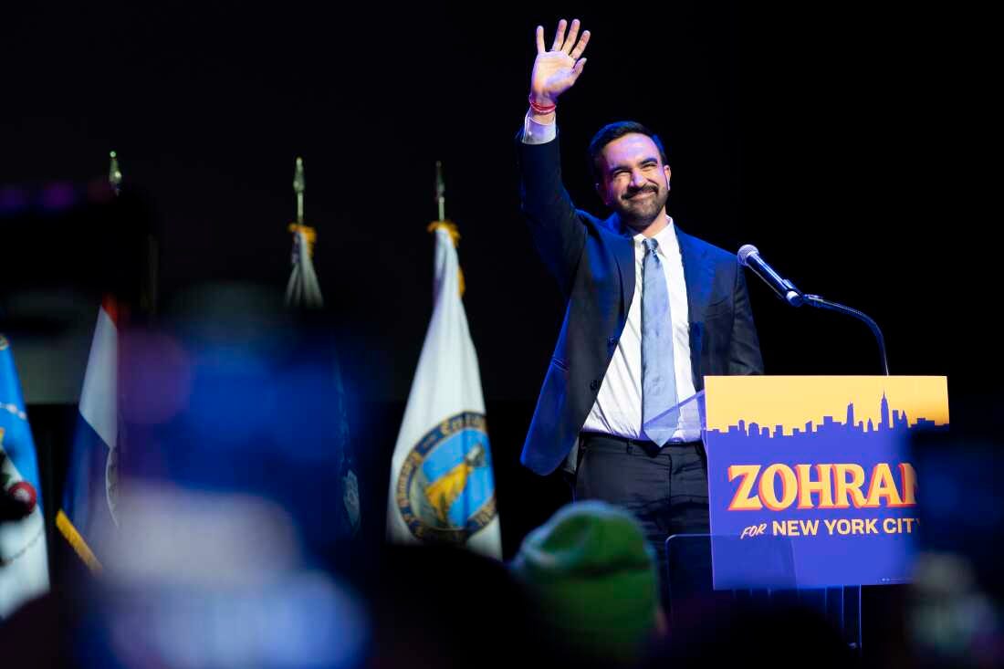 Mayor-elect Zohran Mamdani, right, and his wife, Rama Duwaji, react to supporters during an election night watch party Tuesday in New York. 