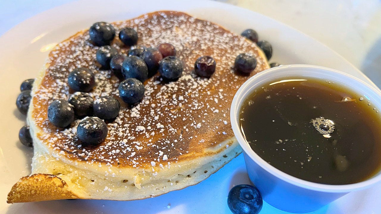 A picture containing cup, plate, food

Description automatically generated