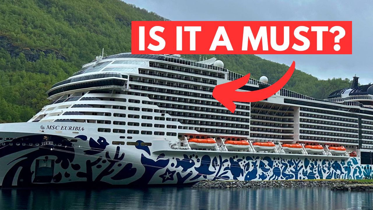 MSC Euribia cruise ship docked in Flåm, Norway, with text "IS IT A MUST" pointing at one of the balconies.