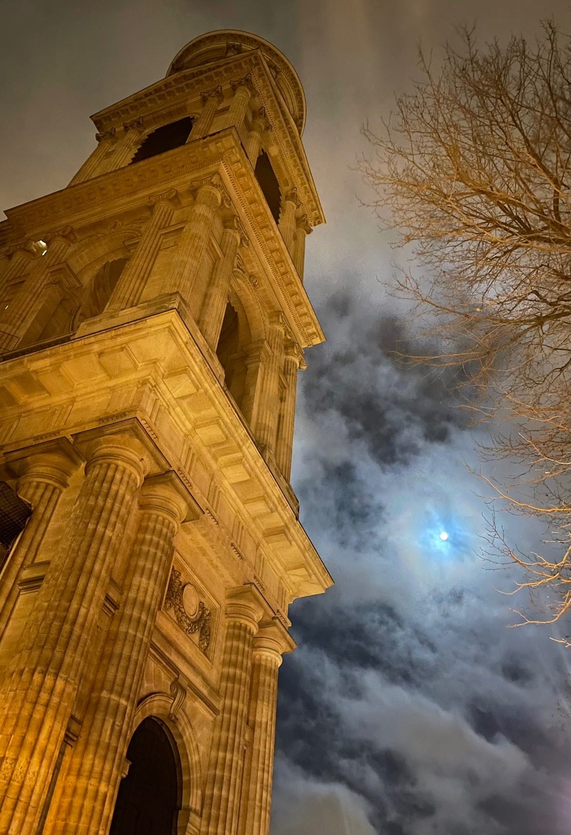 May be an image of bell tower and Sacré-Cœur