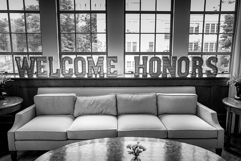 Honors college WELCOME, flowers, signs, pom poms, popcorn, ice bucketes with drinks