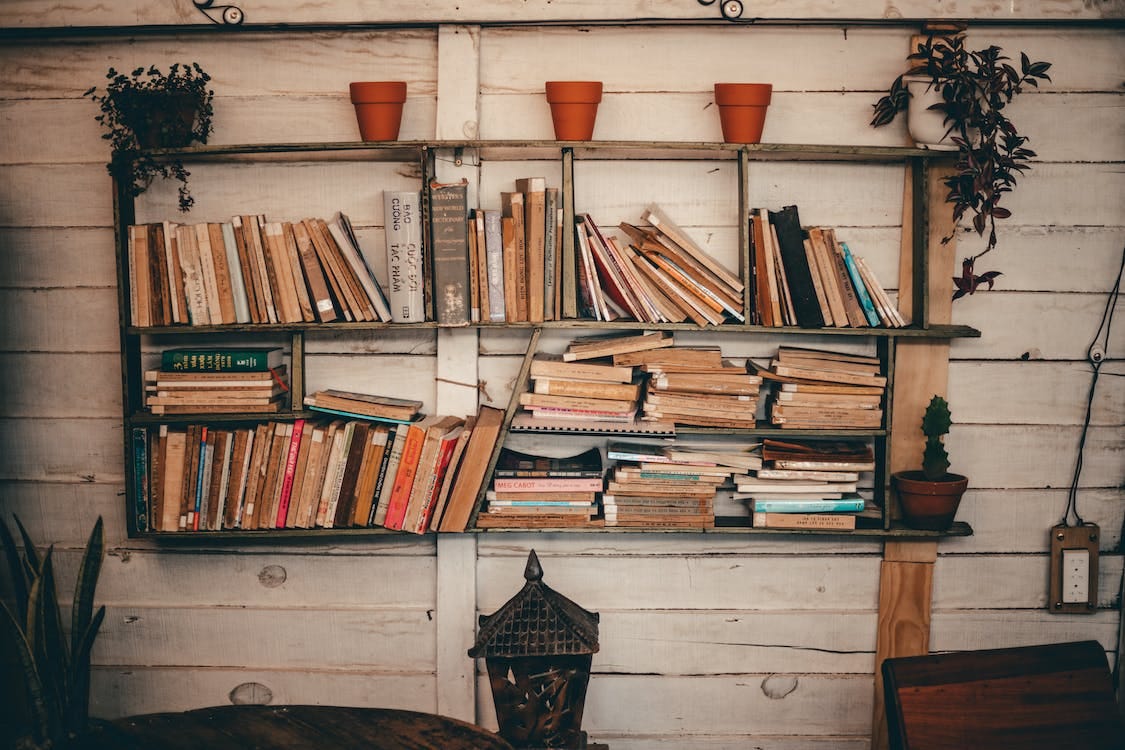 Free Books on Shelves Stock Photo
