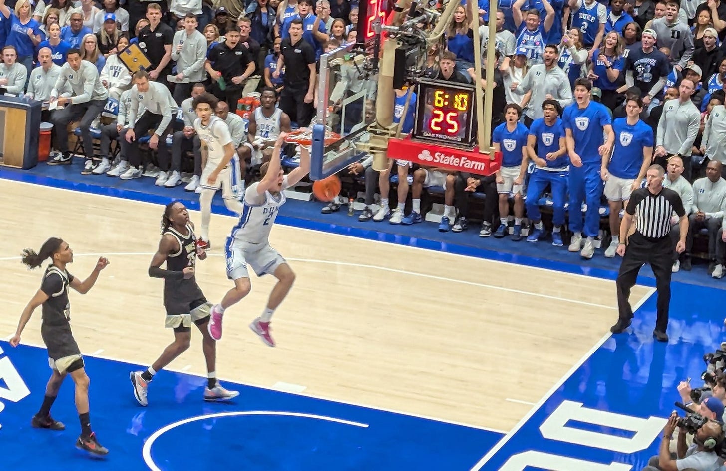 Cooper Flagg dunking in a Duke uniform. Cooper Flagg dunking in a Duke uniform.
