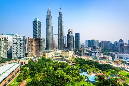 How can I move to Malaysia and make $6,300.75 per month?