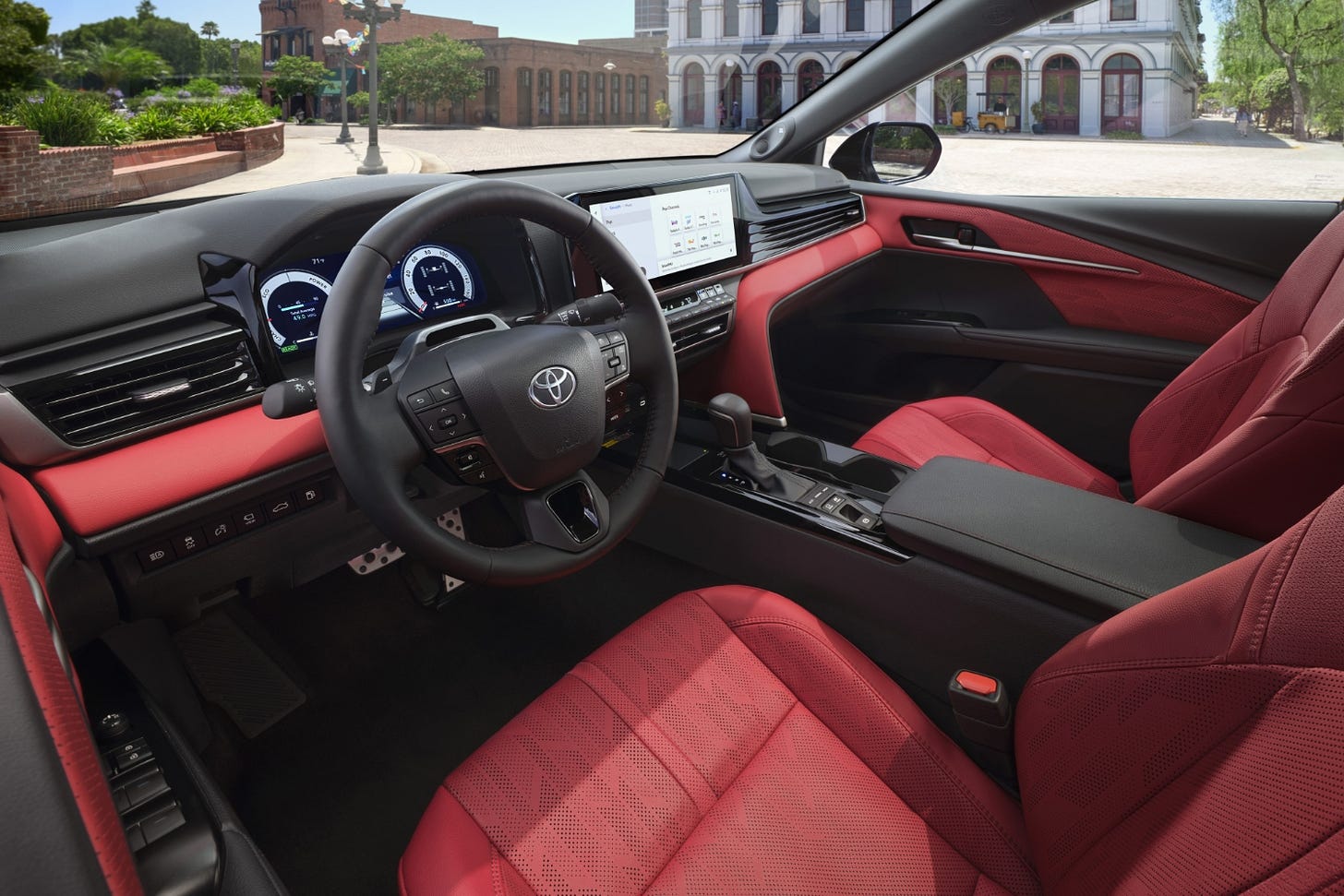 View of the 2025 Toyota Camry XSE interior showing the dashboard and front seats, taken from the driver's door vantage point. View of the 2025 Toyota Camry XSE interior showing the dashboard and front seats, taken from the driver's door vantage point.