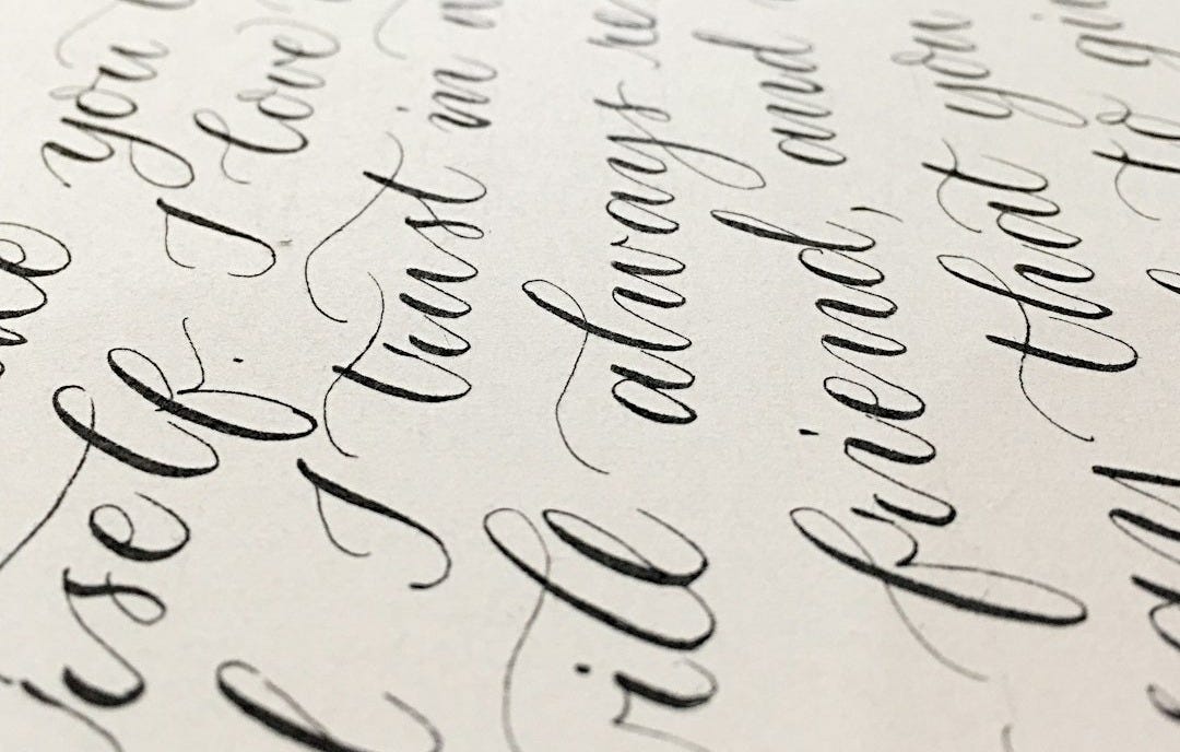 closeup photo of black and white printing paper closeup photo of black and white printing paper