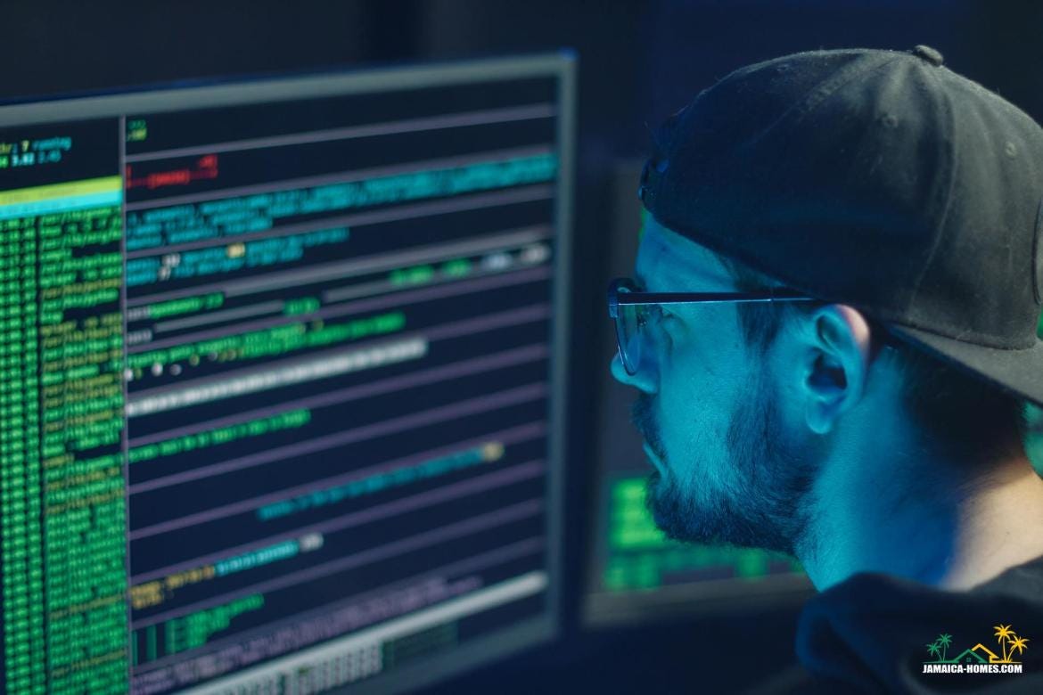 man in blue crew neck shirt wearing black framed eyeglasses