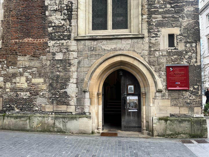 Stained glass and exterior architectural details of the church of St Bartholomew the Less at Barts.