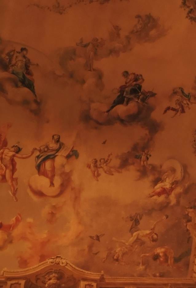 A ceiling with angels and clouds

AI-generated content may be incorrect.