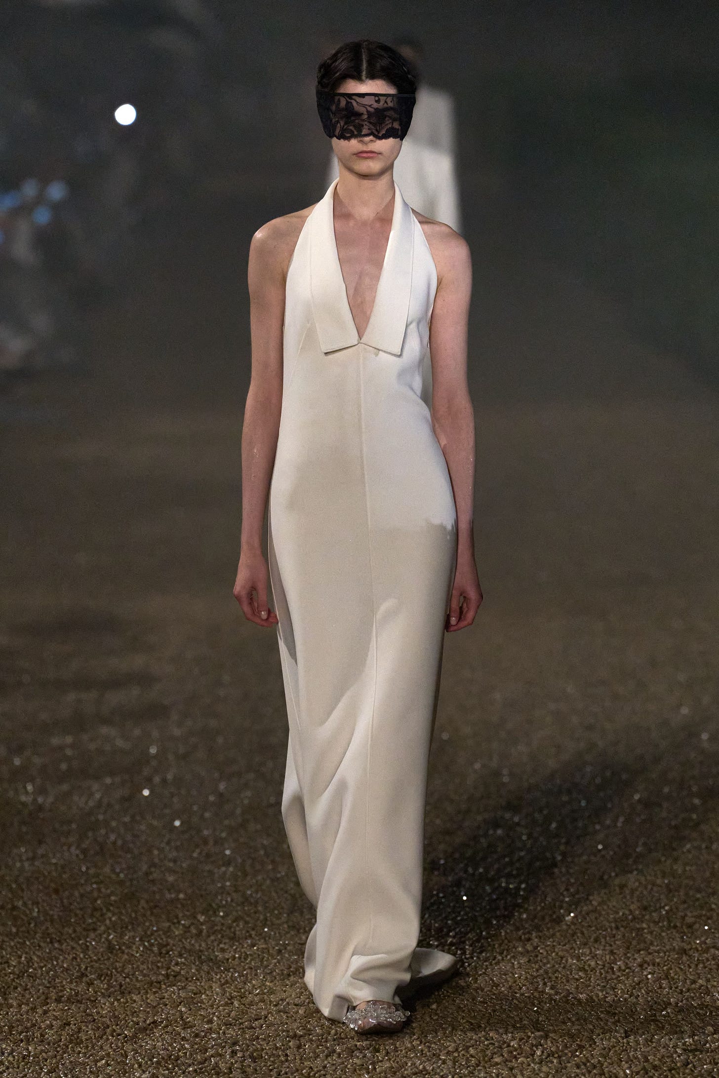 Image may contain Fashion Formal Wear Clothing Dress Gown Wedding Wedding Gown Adult Person and Suit