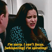 a woman is sitting next to a man and saying i 'm sorry i can 't focus whispering