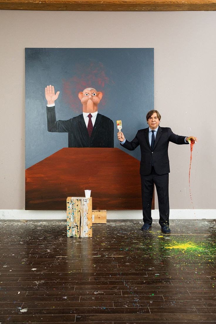 This may contain: a man in a suit and tie standing next to a painting