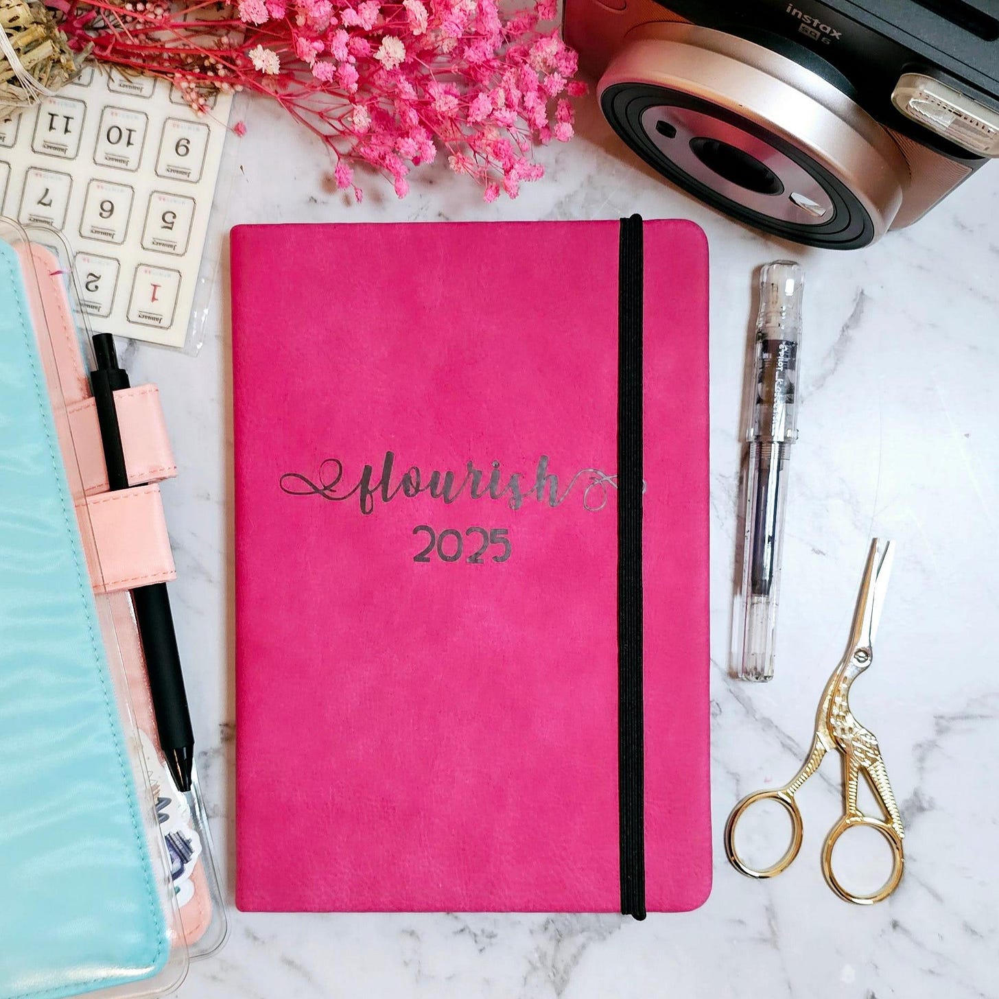 My 2025 Word Of The Year - Flourish - on my blank journal.
