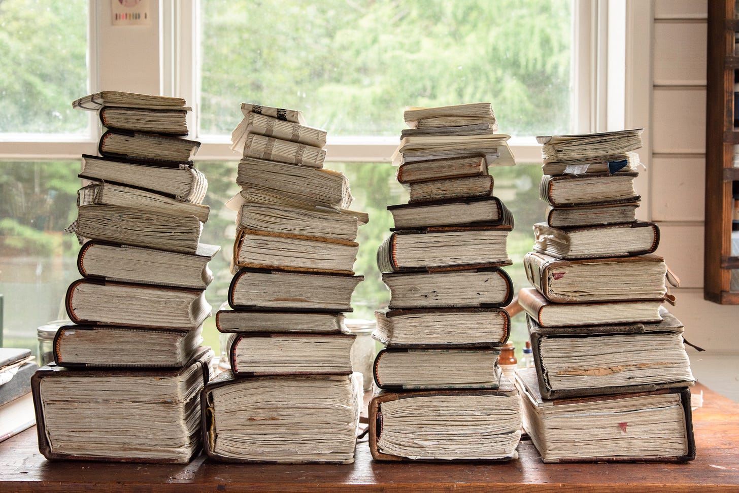 handbound journal sketchbook stack filled up