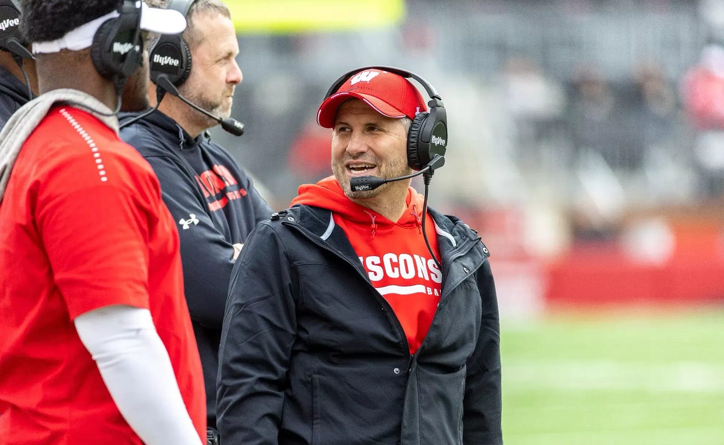 Wisconsin Badgers defensive coordinator Mike Tressel stands on the sideline during a game. (Photo credit: UW Athletics).