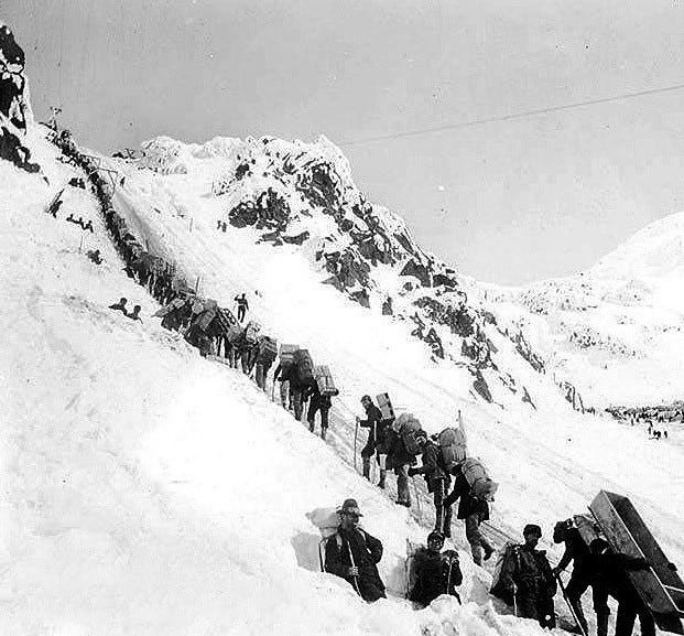 Miners heading over the White Pass on the way to the Klondike Gold Rush Miners heading over the White Pass on the way to the Klondike Gold Rush