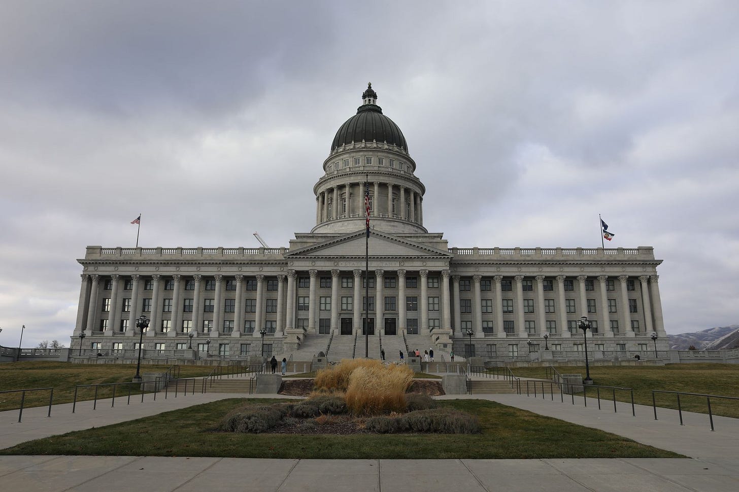 Photo by Alfred Diaz Evangelista on Pexels Front view of the Utah State Capitol in Salt Lake City under cloudy skies. (stock photo)