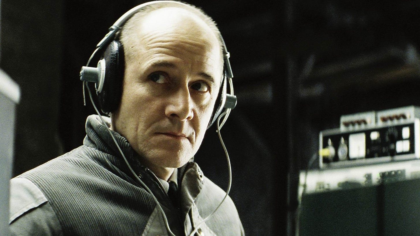 A still from the 2006 Stasi thriller, "The Lives of Others," in which a member of the secret police is wiretapping a playwright's house