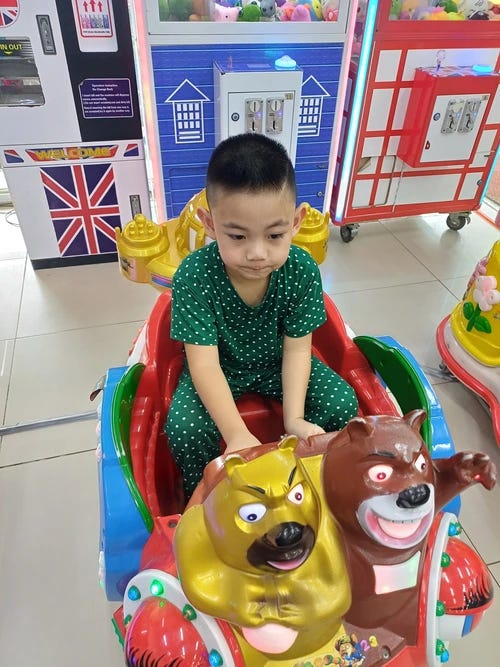 Rafa enjoying the kiddie ride in Divi Mart, San Antonio