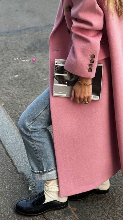 This contains an image of: pink coat