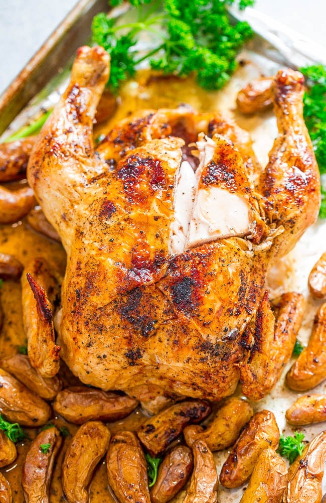 Sheet Pan Whole-Roasted Chicken and Potatoes — FOUR ingredients + ONE pan = PERFECT roasted chicken with ZERO cleanup!! Your new FOOLPROOF and EASY whole roasted chicken recipe that's ready in 1 hour!!