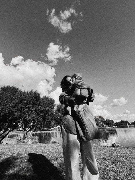 baby boy in nature, with mama, & daddy.