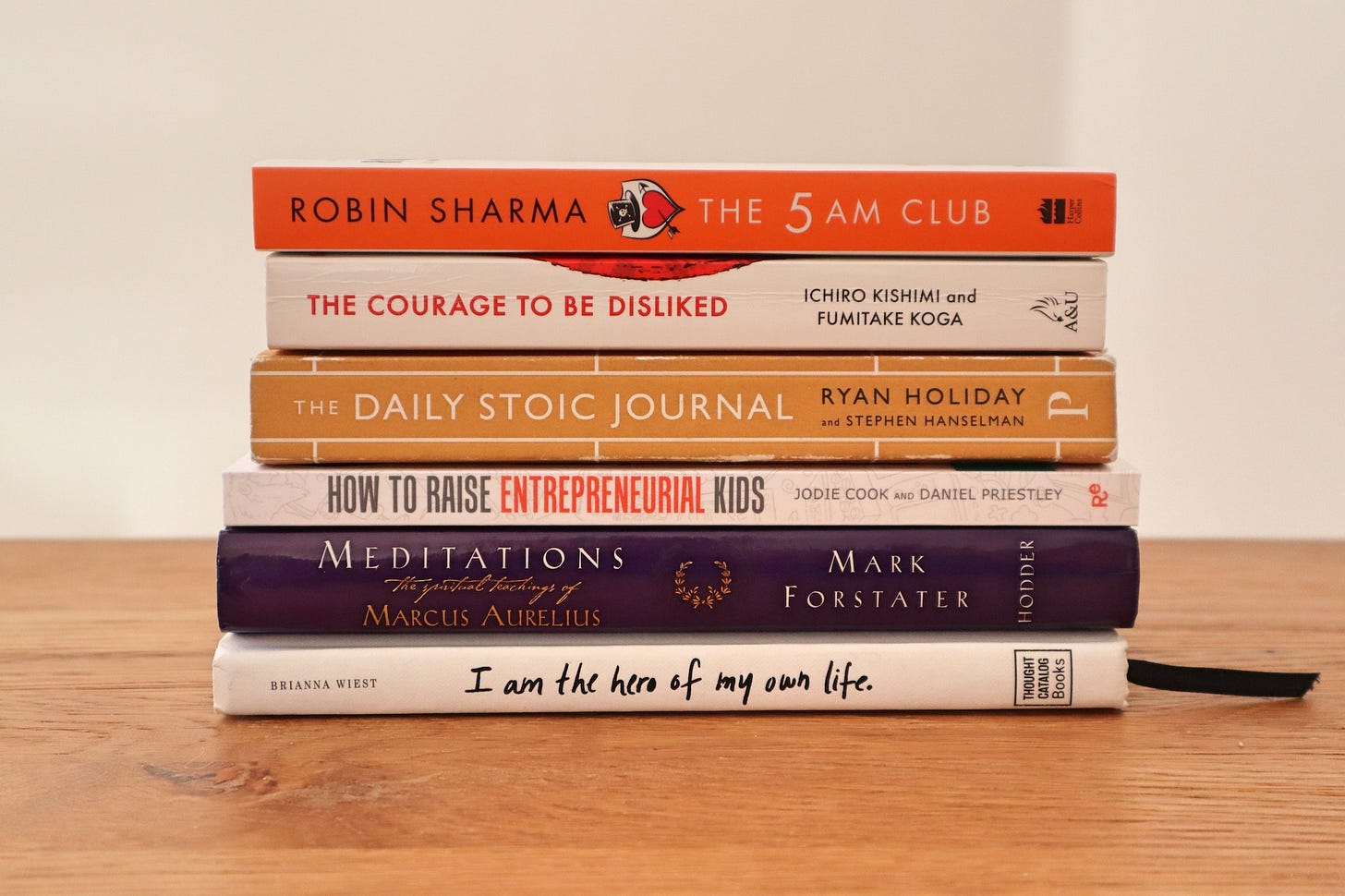 stack of personal development books