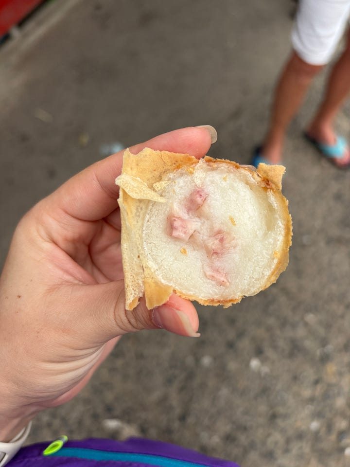 A traditional Thai dessert made with coconut rice flour and coconut milk. They are usually topped with taro or sweet corn, slightly crispy on the outside and creamy on the inside.