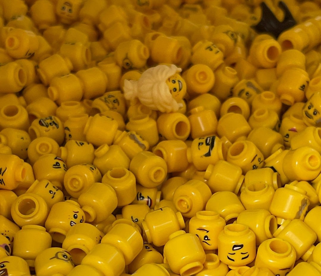 a large pile of yellow rubber ducks