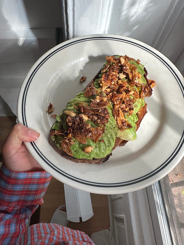 left: Chinese scallion pancake - I get a pack, frozen, and heat one up on a pan with oil and add an egg with a spoon-full of my homemade chili crisp; right: avocado on toast and chili crisp (would be even better with some homemade pickle onion)