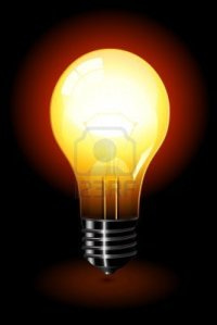 6568967-bright-light-bulb-standing-isolated-over-a-black-background