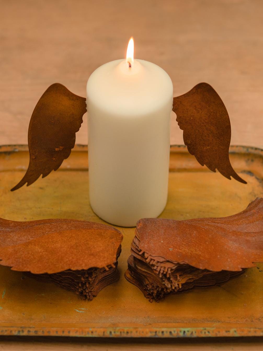 Rusty metal candle wings