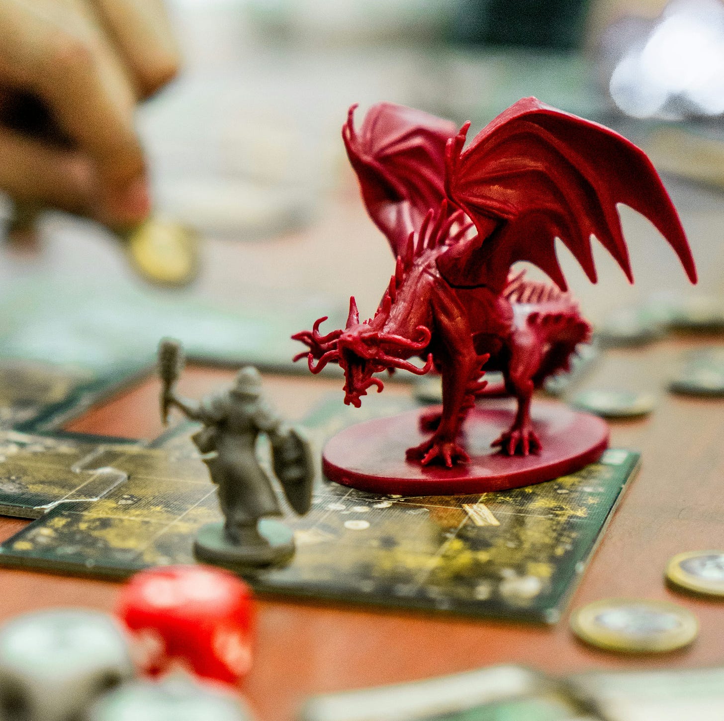 red dragon action figure on table
