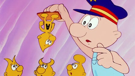 Gif da "Siamo fatti così" con un omino vestito di azzurro e cappellino blu che regge una creaturina gialla capovolta con la lettera A sul ventre, mentre altre tre creaturine gialle lo guardano dal basso (sono simboli delle base azotate del DNA). Lo sfondo è rosa.
