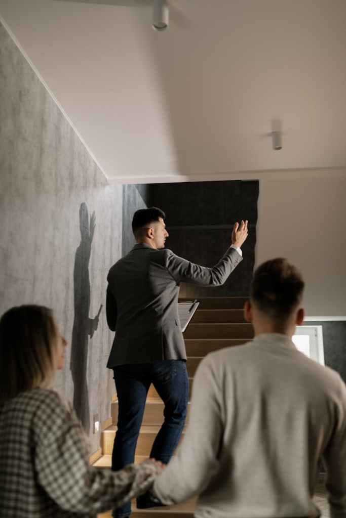 a real estate broker giving a house tour