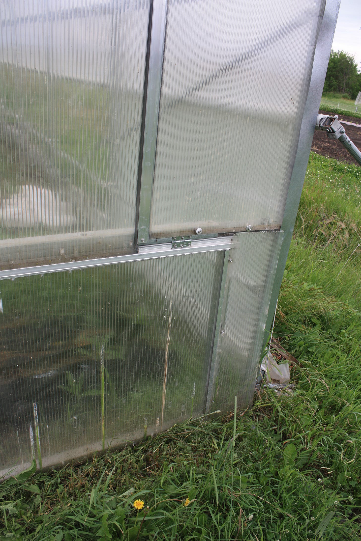 lower corner of an end wall