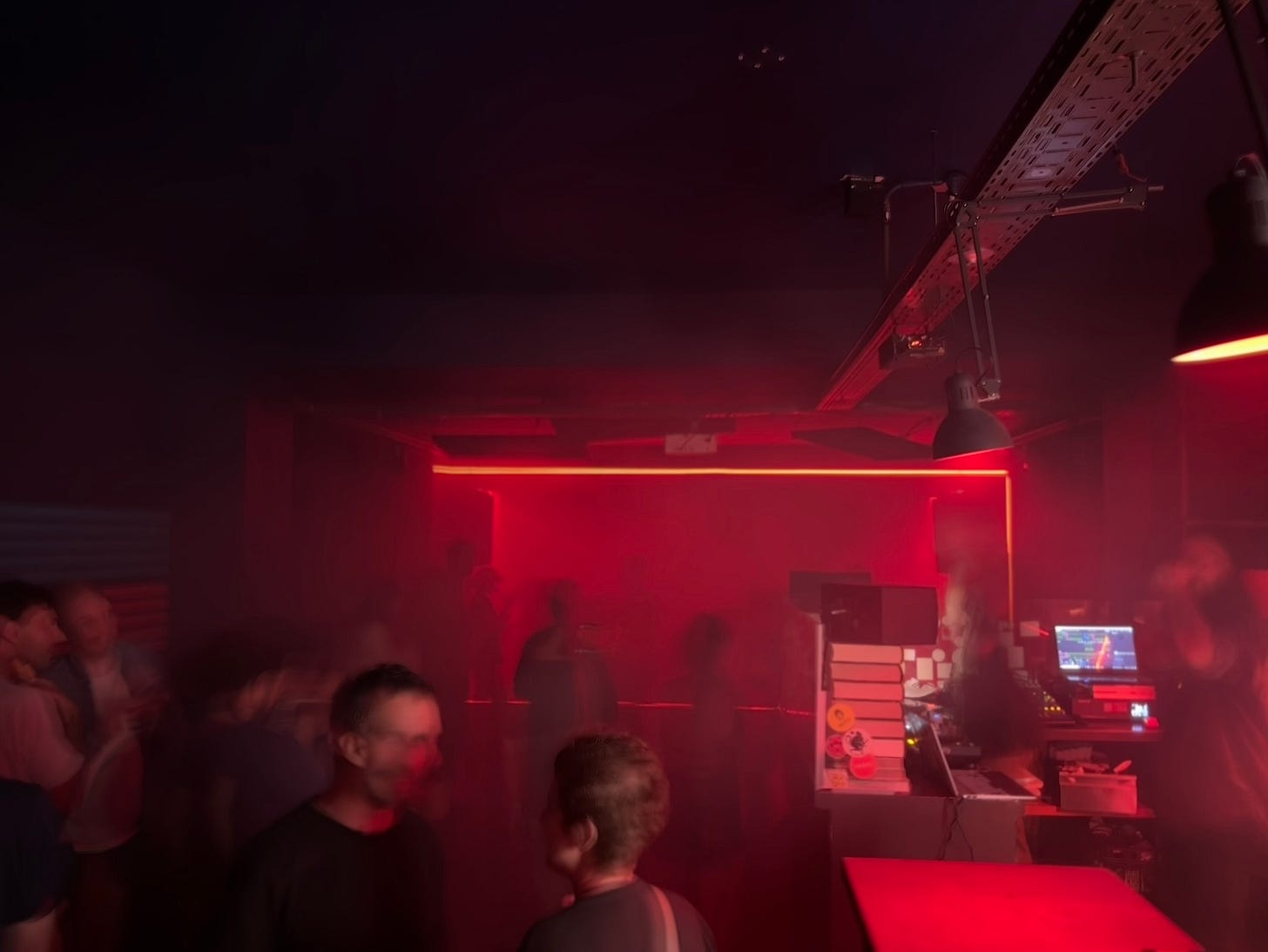 Photo taken in a small nightclub in Barcelona in room with red light, which was the venue of the Hype Studies conference after party. Photo taken in a small nightclub in Barcelona in room with red light, which was the venue of the Hype Studies conference after party.