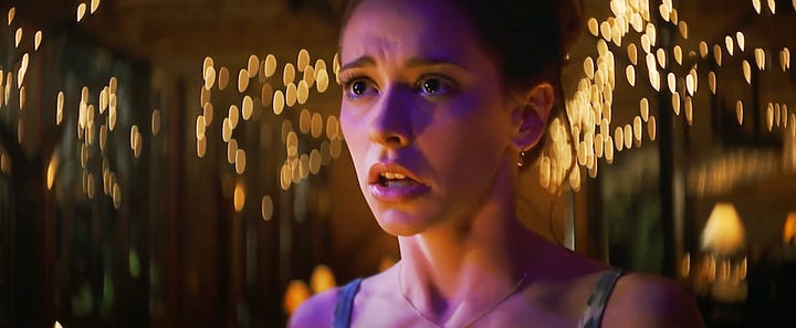 Scene from I Still Know What You Did Last Summer with Jennifer Love Hewitt as Julie James singing I Will Survive at a karaoke bar