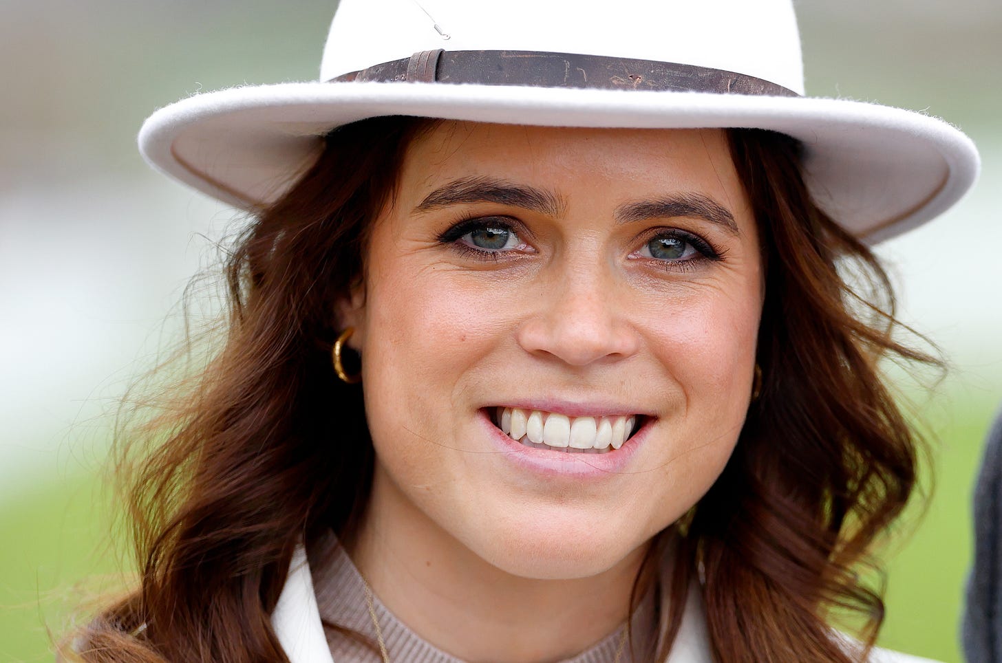 Princess Eugenie smiling at Cheltenham Festival