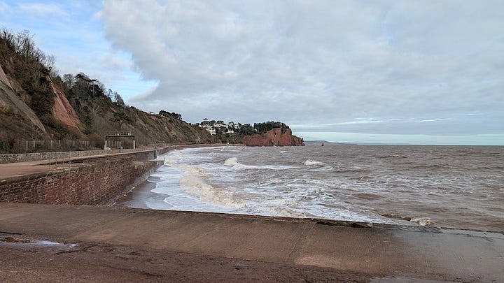 Scenes of the tide coming in on the beach at Teignmouth in Devon