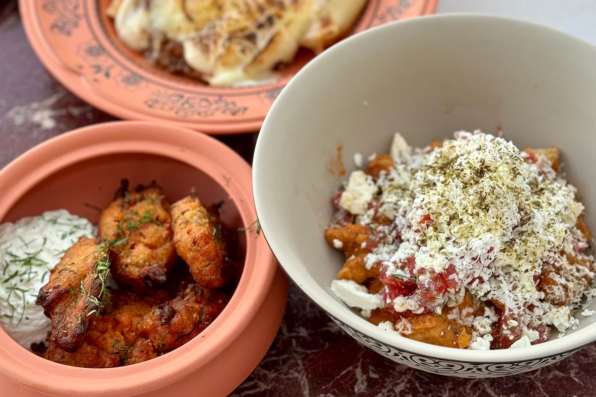 Traditional Greek food at Adami Canaves Ena
