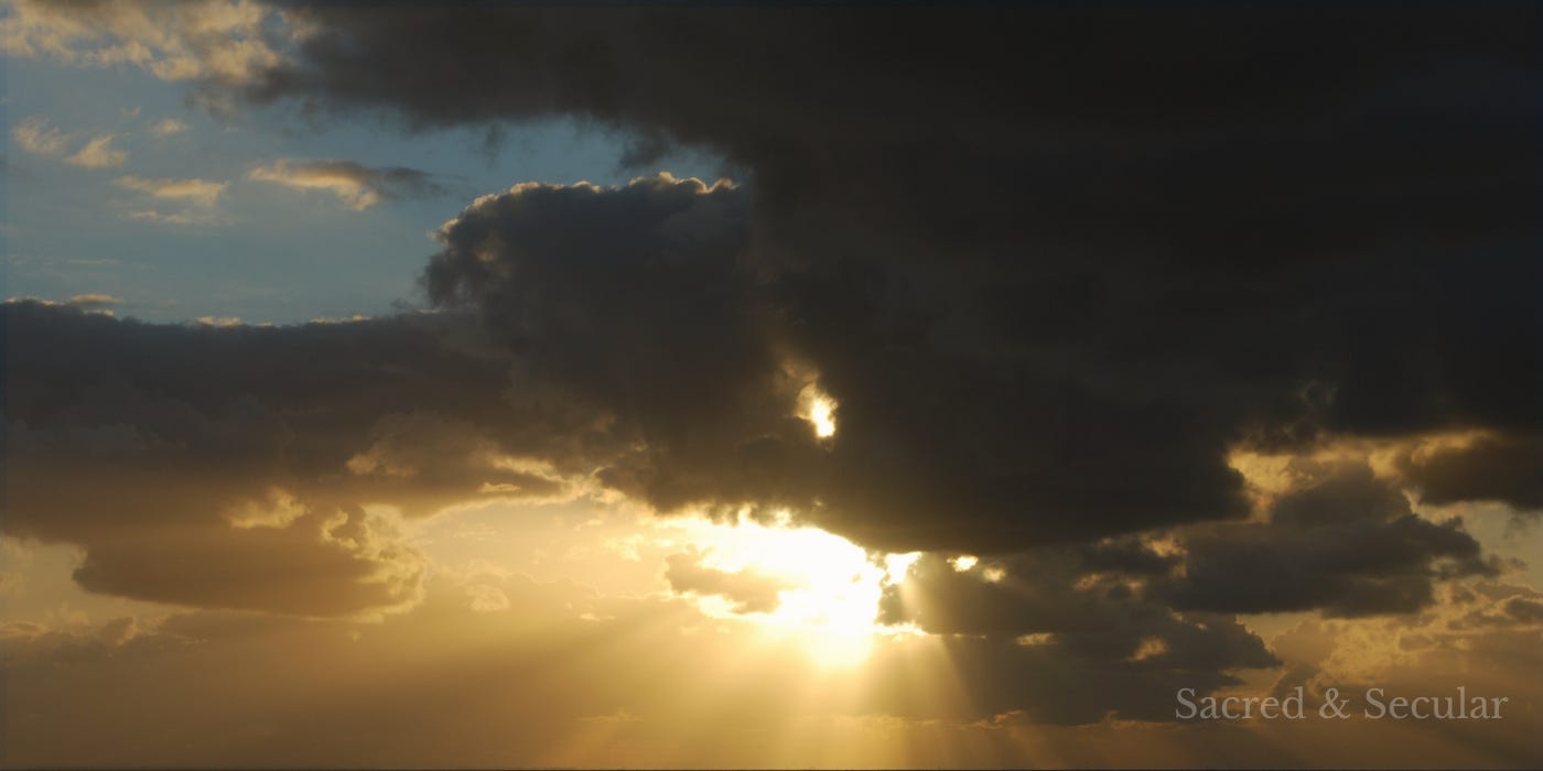 Sunlight breaks through dark storm clouds, illuminating the sky below. The image symbolises hope, humility, and the journey of faith that continues even when the way ahead is not fully clear. Sunlight breaks through dark storm clouds, illuminating the sky below. The image symbolises hope, humility, and the journey of faith that continues even when the way ahead is not fully clear.