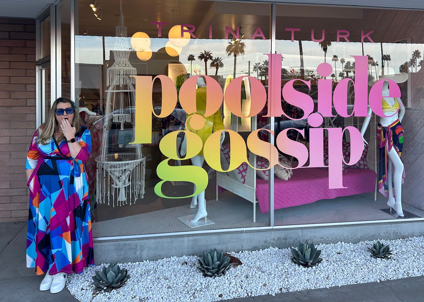 Me in front of the iconic Palm Springs fashion designer - Trina Turk&rsquo;s always fun window displacy - February 2025